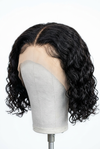 Deep wave short bob wig on a stand showing lace front detail and wave texture